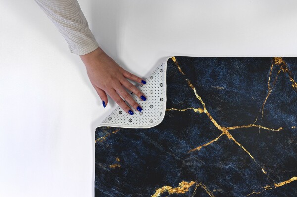 Tapis Motif abstrait dans les tons de gris.