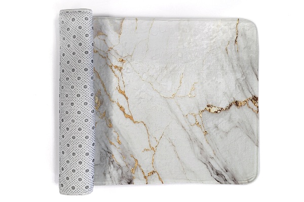 Tapis Motif de marbre dans les tons de beige.