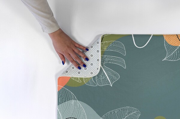 Tapis Motif géométrique aztèque avec losanges colorés.