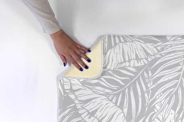 Tapis Feuilles tropicales en nuances de gris