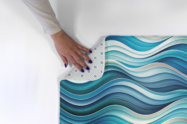 Tapis Lignes ondulées dans les tons bleus